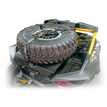 Load image into Gallery viewer, Installed Maverick R tire carrier rack, supports spare and gear for overlanding

